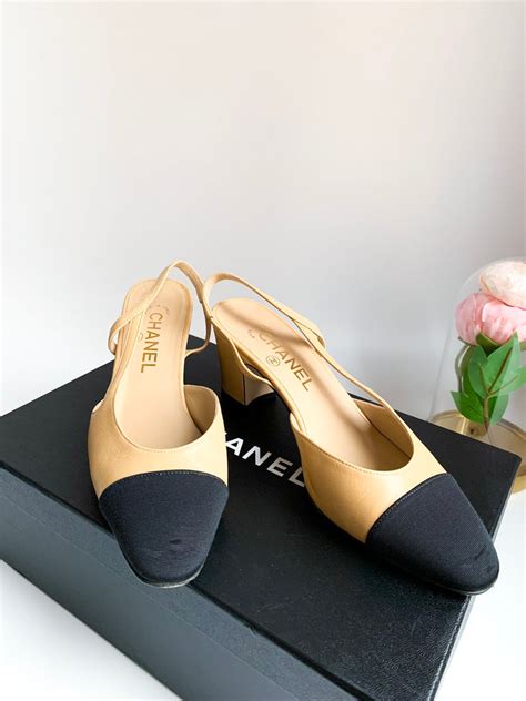 chanel black and gold shoes|Chanel beige and black shoes.